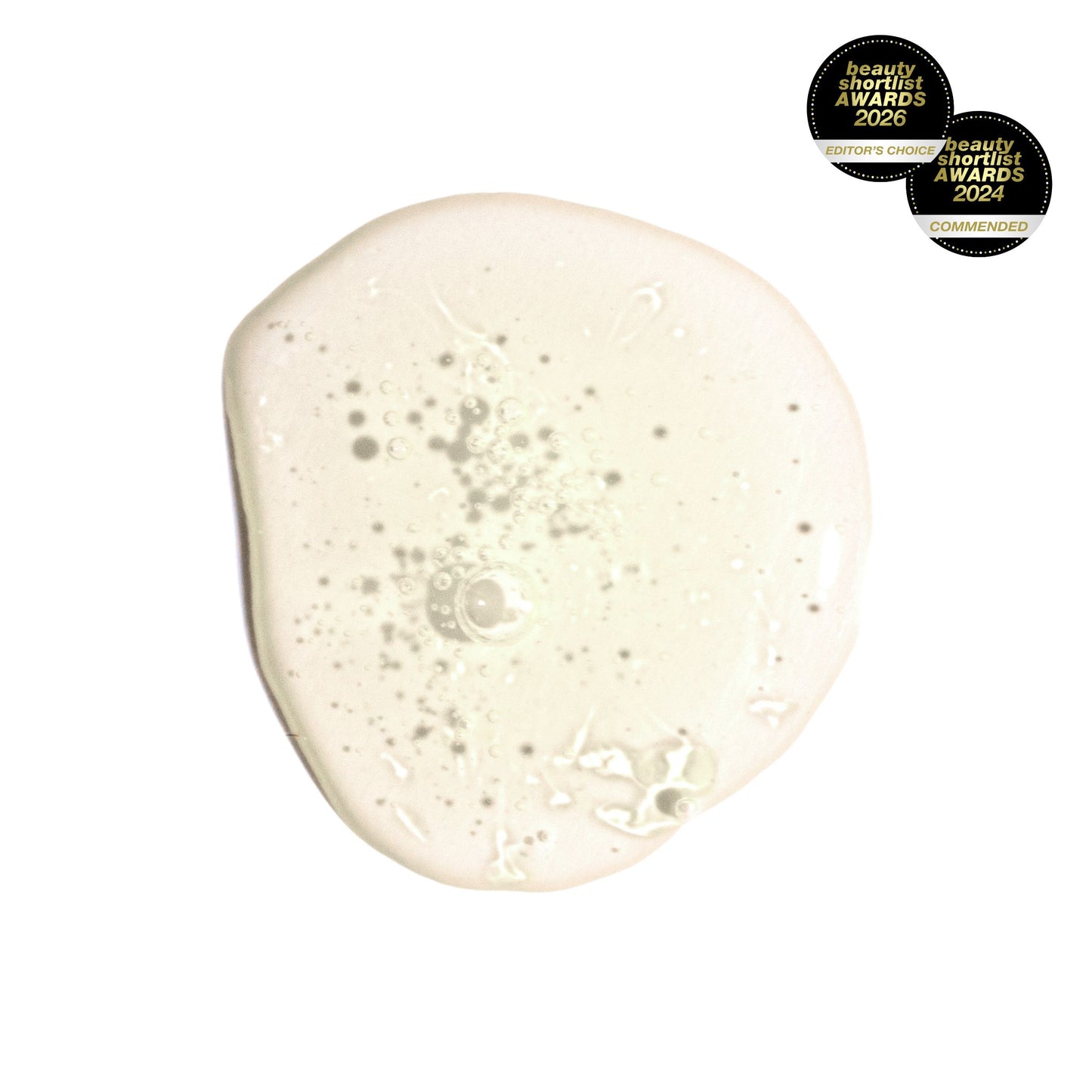 MATER Beauty I WOKE UP LIKE THIS Beyond-Hydration Perfecting Serum texture sample swatch on a white background - sheer yellow runny jelly-like liquid. 