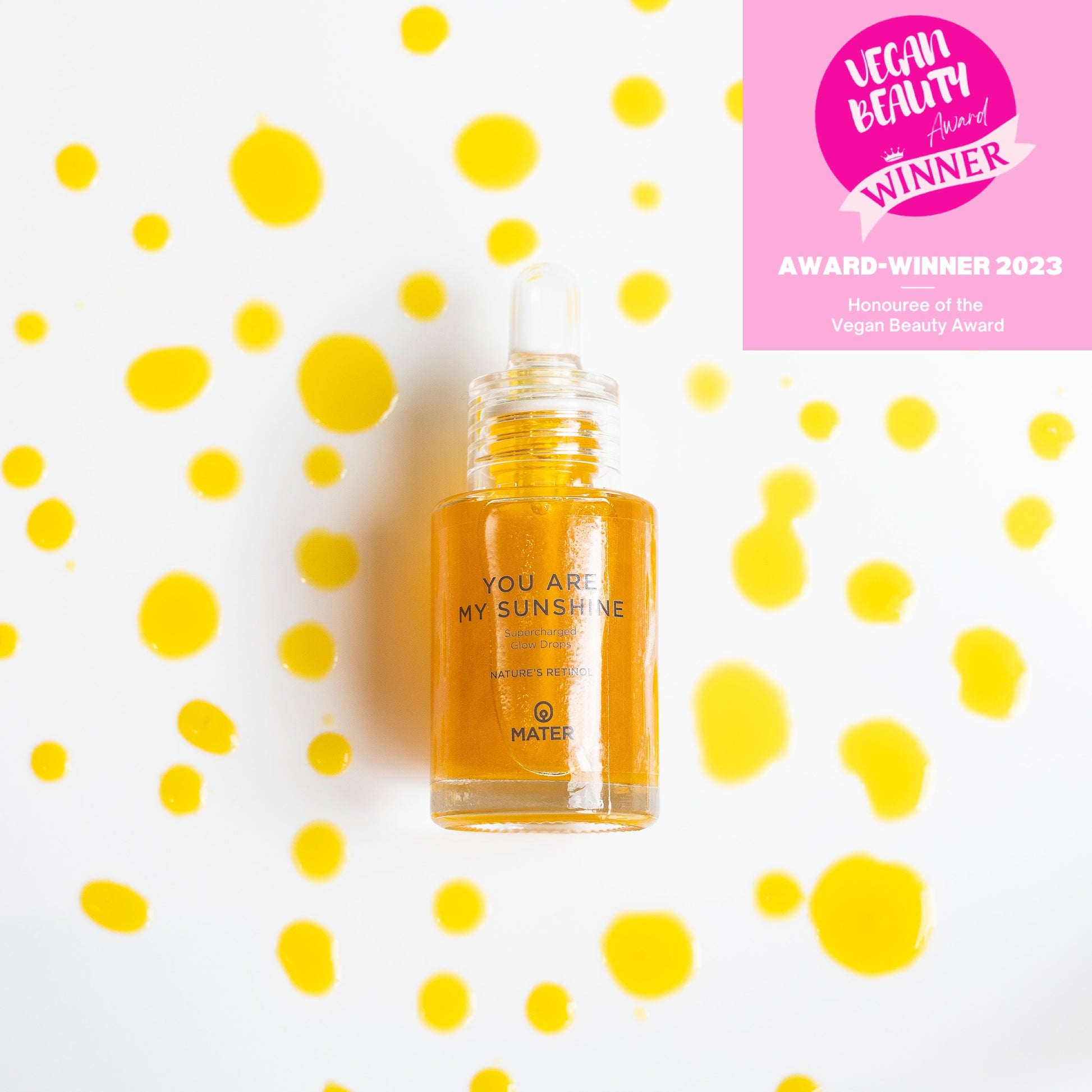 YOU ARE MY SUNSHINE Supercharged Glow Drops product shot with Vegan Beauty award seal and product drops on white background